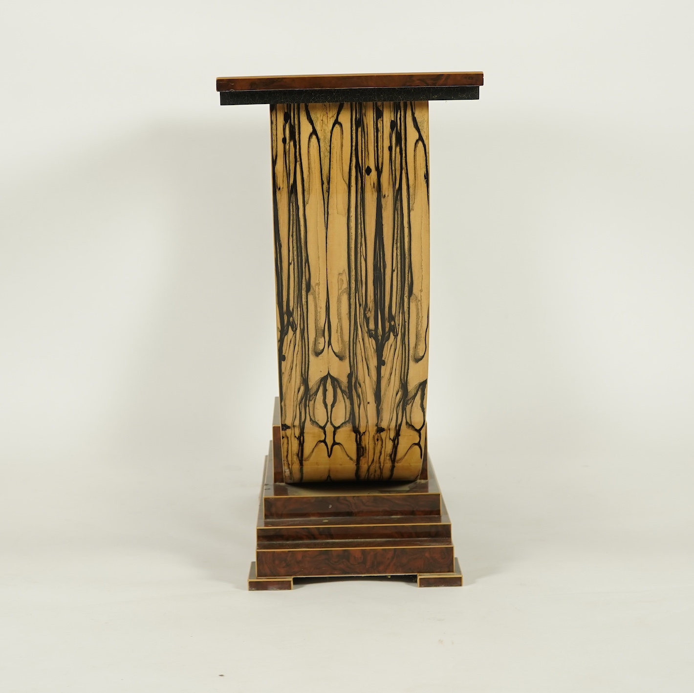 An Art Deco style white ebony and walnut console table